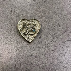 Gold tone mother pin